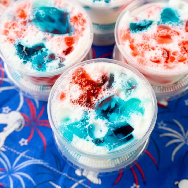 July 4th Stained Glass Jello Shots on snoopy napkin and gray wood
